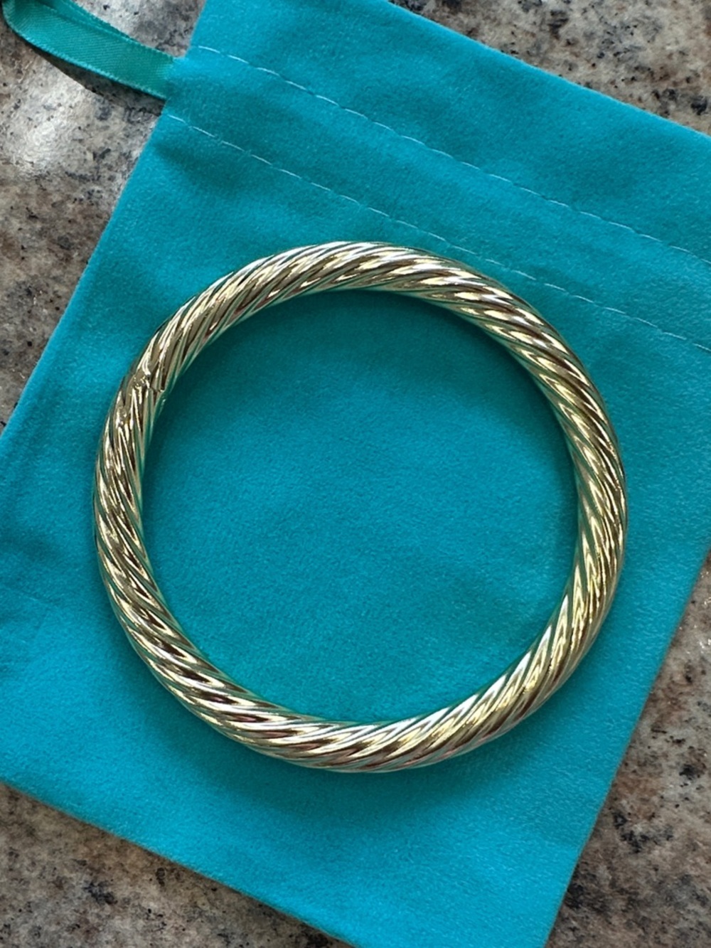 New in packaging. Betty Carre Bangle bracelet. Paola bangle. 18k Gold plated